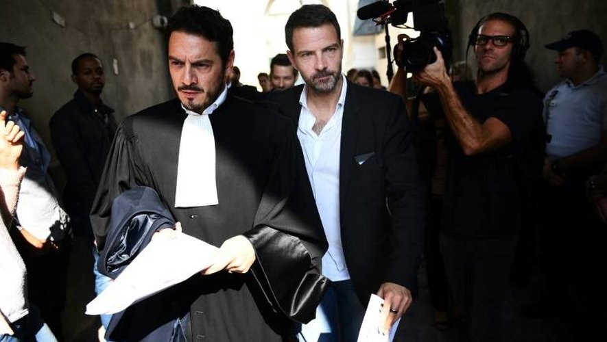 Jérôme Kerviel et son avocat David Koubbi à la sortie du palais de justice le 23 septembre 2016 à Versailles