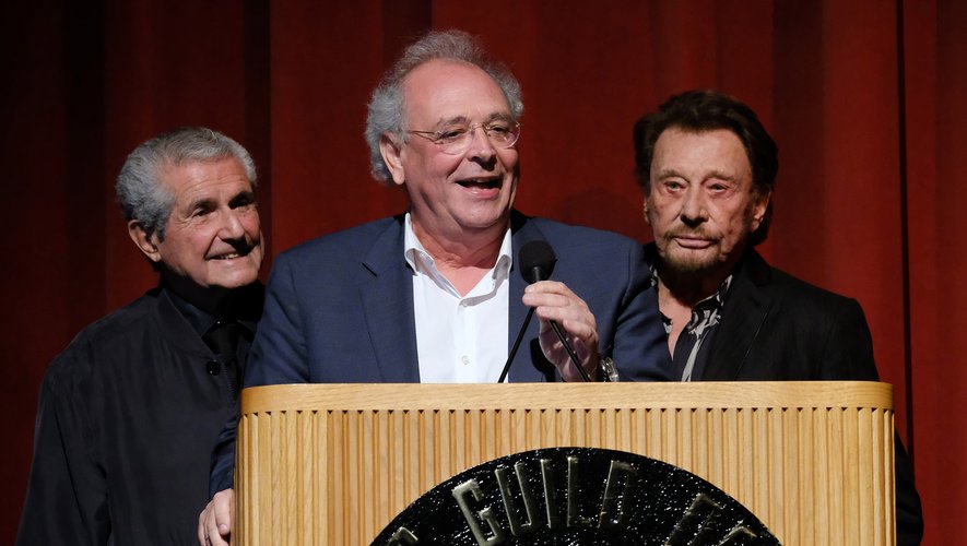 Samuel Hadida, entouré de Claude Lelouch (à gauche) et Johnny Hallyday lors du Colcoa French Film Festival à Los Angeles