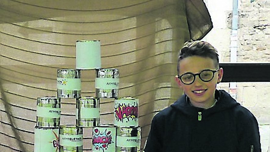 Erwan, 12 ans, 3e année de participation au Téléthon avec le stand qu’il a créé « le Chamboule tout »