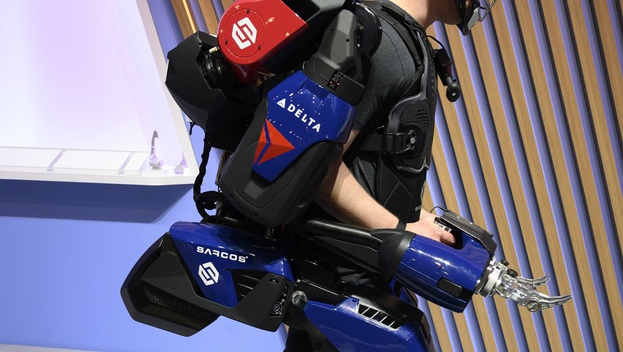 A man demonstrates the capabilities of the Sarcos Guardian XO exoskeleton at the 2020 Consumer Electronics Show (CES) in Las Vegas
