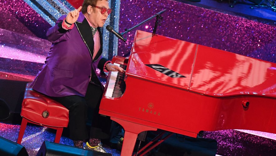British singer-songwriter Elton John performs onstage