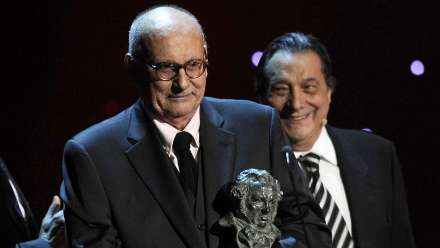 In this file photo taken on February 14, 2011 Spanish film director Mario Camus receives the Honor award during the Goya Film Awards ceremony at Teatro Real in Madrid.