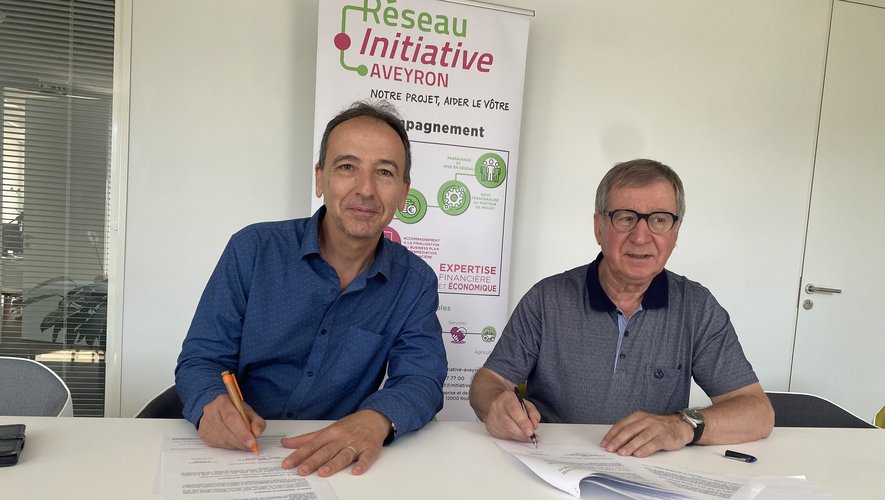 Alain Picasso, directeur du programme d'EDF Hydro et Guy Cayssials, président d'Initiative Aveyron.