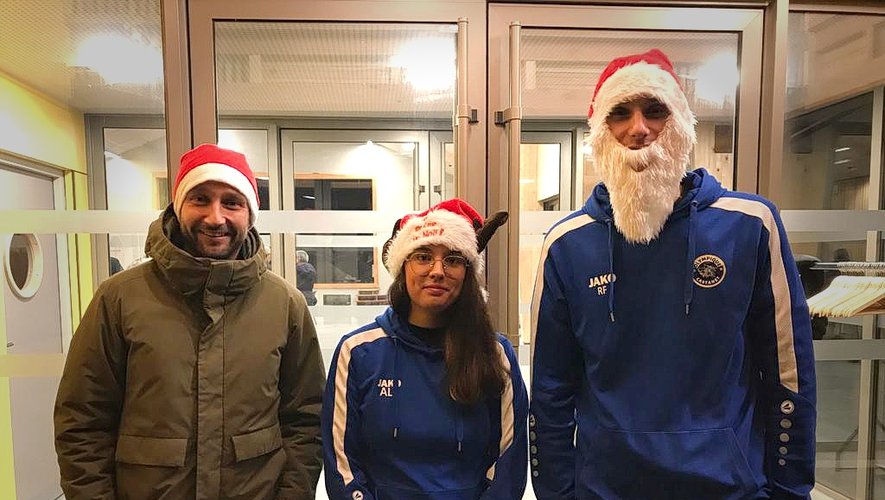 Philippe Feltz, Laurie et Fabrice Roy, membres du bureau Olympique Castanet, heureux de lancer cette première édition du marché de Noël.